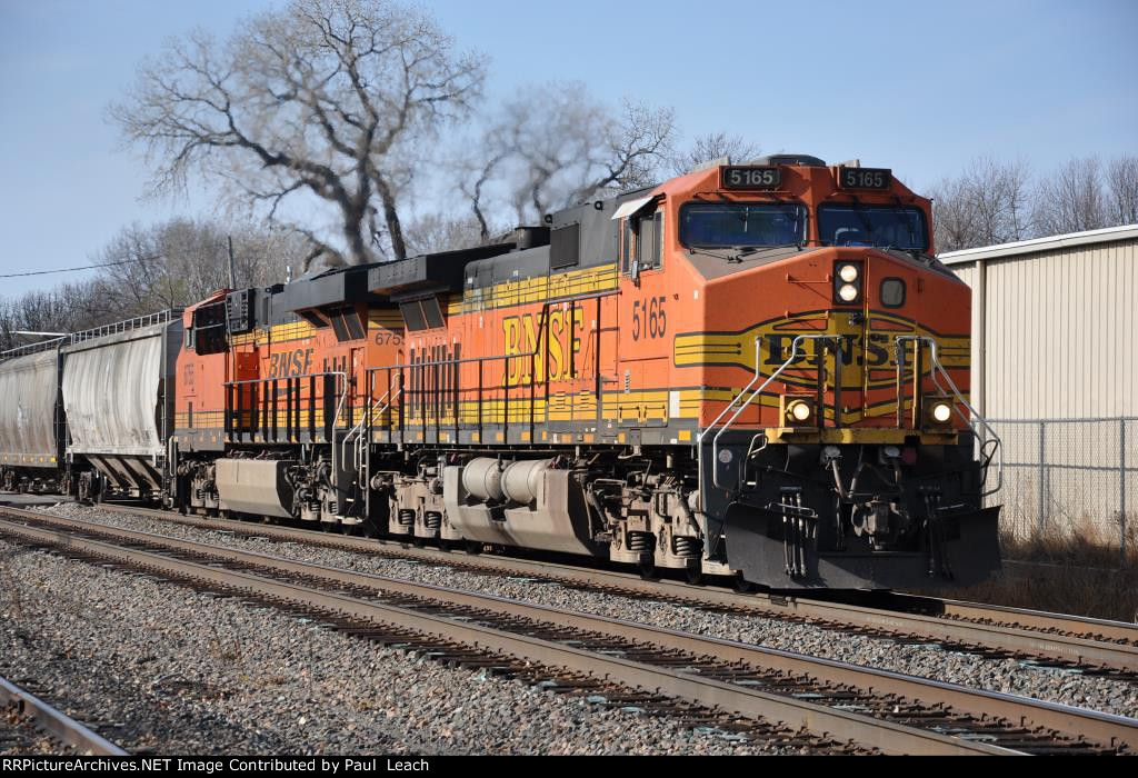 Grain train rolls east towards a crew change